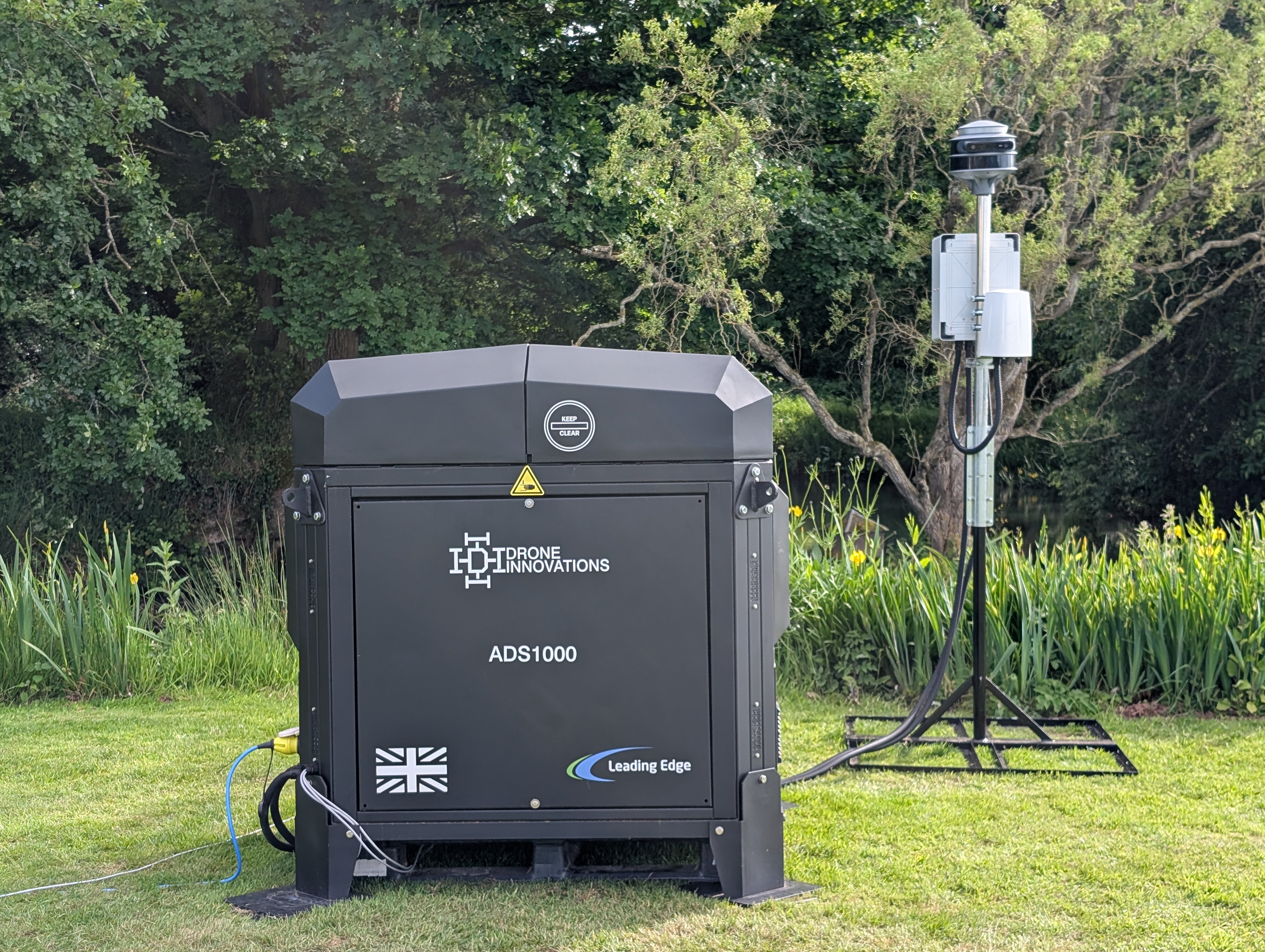 Autonomous drone docking station powered by off-grid IoT power supply system